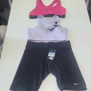 Nike Womens BLK Biker Shorts &amp; 2 Pink &amp; Lavender Sports Bras Size M NWT